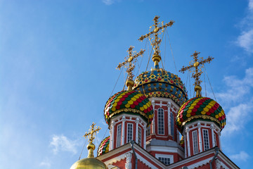 Fototapeta na wymiar Bright colored domes of the Christian Church