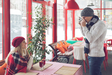 Young photographer with a girl