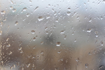 Drops at a window. Rain. Rain drops. Wet glass. Cold weather. Good background. Abstract texture.