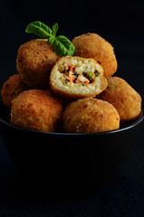 Rice balls in black bowl