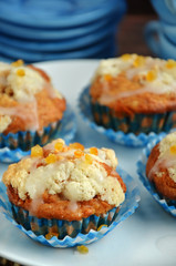 Muffins with apples on white plate