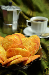 Sweet cookies on green background
