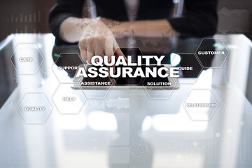 Fototapeta na wymiar Quality assurance concept on the virtual screen. Business concept.