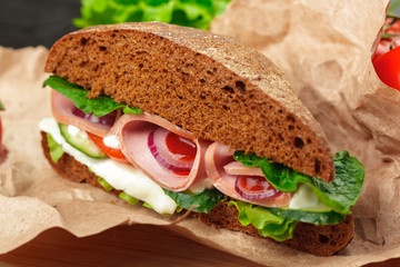sandwich on a wooden table
