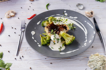 Beautiful served food on plate, meat with natural vegetables