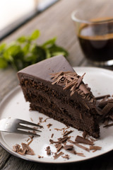 chocolate cake on wood background.