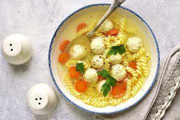 Soup with chicken meatballs and pasta,Top view.