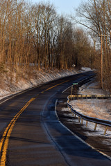 Fototapeta premium Empty country road in winter. 