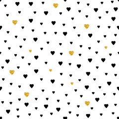 Seamless pattern from the black and gold hearts.