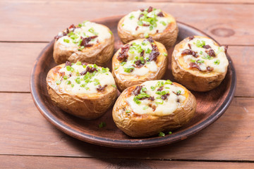 Baked potato stuffed with cheese