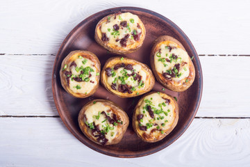 Baked potato stuffed with cheese
