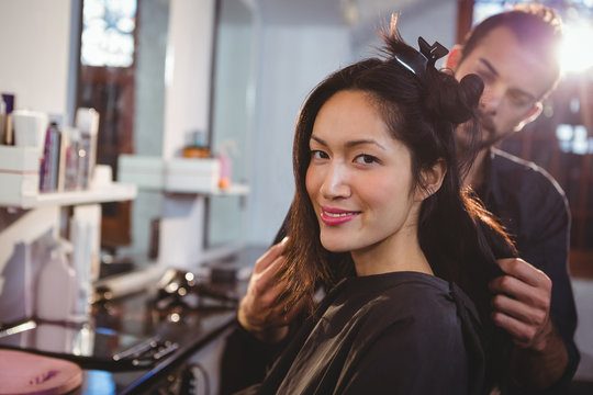 Hairdresser working on the client