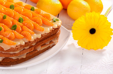 Cake, citrus pie, decorated with mandarin and mint