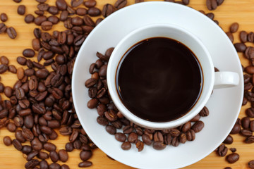 Fototapeta premium Coffee cup and coffee beans