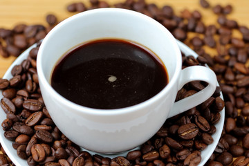 Coffee cup and coffee beans