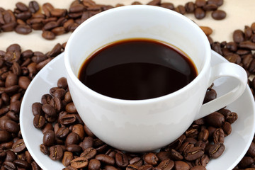 Coffee cup and coffee beans