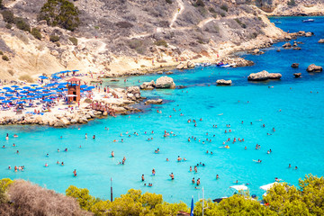 People at the famous beach of Konnos Bay beach near Protaras, Ayia Napa. Famagusta District, Cyprus