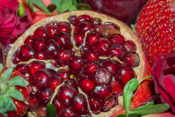 Bright red beautiful bouquet of fruits and flowers