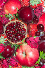 Bright red beautiful bouquet of fruits and flowers