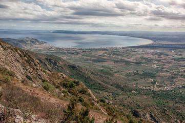 Naklejka premium View over Pyrenees mountains and Mediterranean Sea . Beautiful landscape composition. Llanca. Spain. Girona.