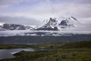 Torres del Paine Mountains and Pond Amidst the Clouds