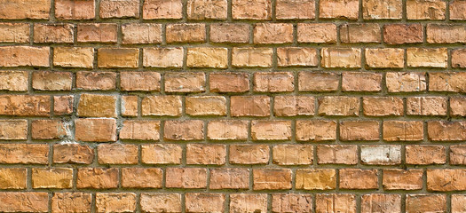 Old vintage red brick wall fragment banner background texture