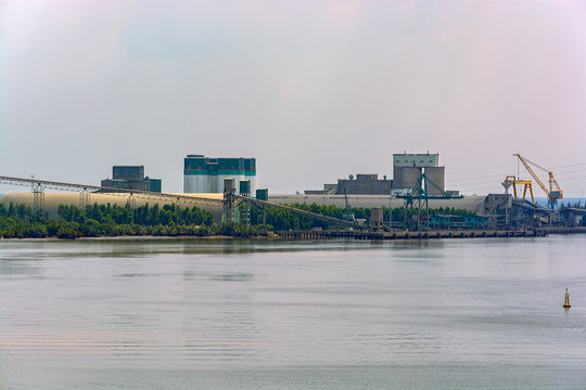 Cement terminal on the bank of the river.