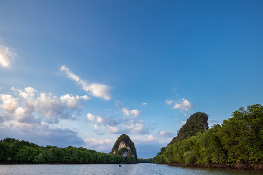 The riverside and mountains : Khao Khanab Nam (paralled hills to water), a symbol of Krabi Province of Thailand.