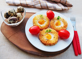 Quail egg toast, egg in a basket with quail eggs, saffron and cherry tomatoes