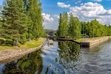 Foto op Plexiglas Kanaal The old part of the gateway on the Saimaa canal. Finland
