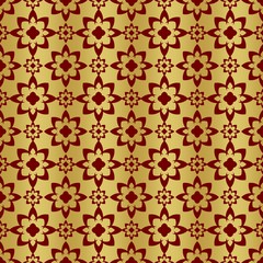 Gold and red background with seamless pattern, suitable as wrapping paper.Gold and red paper with seamless abstract pattern. Imitation of gold.