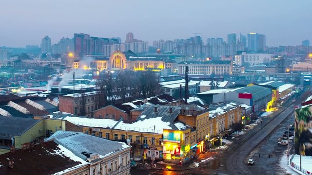 Kyiv, Ukraine. Aerial view of main Railway station in Kyiv, Ukraine in the morning. Time-lapse with cloudy sky at sunrise, zoom in