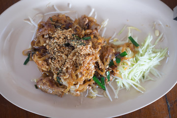 Asian rice noodles with pork and vegetables