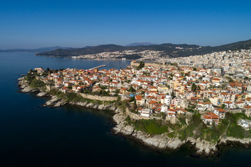 Fototapeta na wymiar Aerial view the city of Kavala in northern Greek, ancient aqueduct Kamares, homes and medieval city wall
