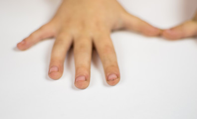 Dirt under the fingernails of a little boy.