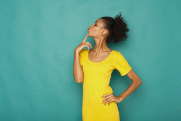Young attractive woman posing in studio