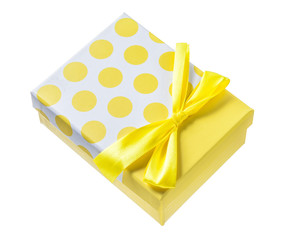 Yellow gift box isolated on white