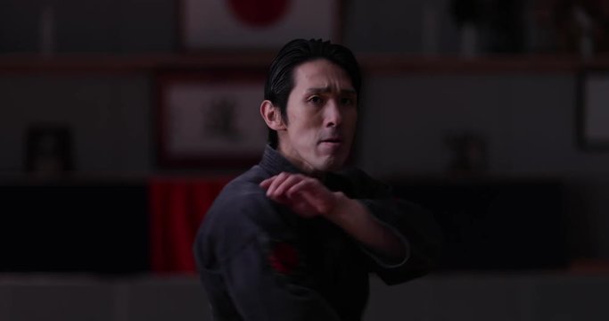 Japanese male practicing Martial arts in Dojo in Tokyo, Japan