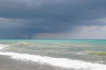 Beach on the Mediterranean in a cloudy day