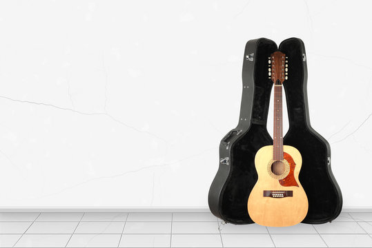 Home interior -  Front view twelve-string acoustic guitar hard case of white wall