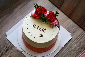 Sponge cake with flowers and biscuits