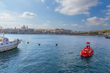 The Bay of Marsamhette, Malta. In the background - Valletta