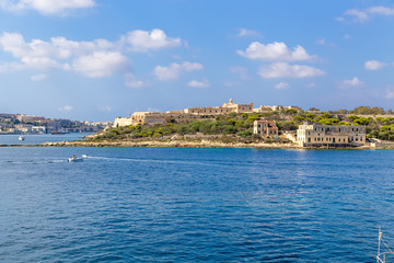 Fototapeta na wymiar The Bay of Marsamhette, Malta. Fort Manoel on the island of the same name
