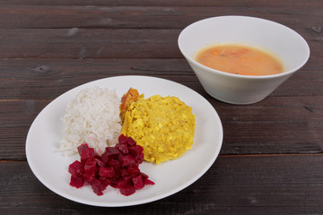 Cauliflower with turmeric and rice on a table