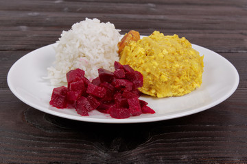 Cauliflower with turmeric and rice on a table