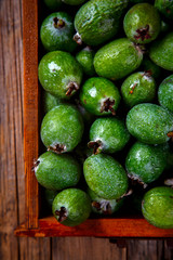 Feijoa Fruits. Fresh ripe sweet .Tropical fruit. Background of green color.Food or Healthy diet concept.Super Food.Vegetarian.Top View.Copy space for Text.selective focus.
