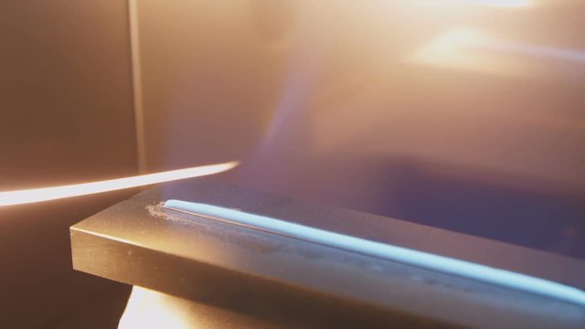 Blue Gas Flame Burned by Flash In Lab Container