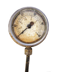 Old rusty round industrial pressure gauge with numbers round the dial mounted on a metal surface of...
