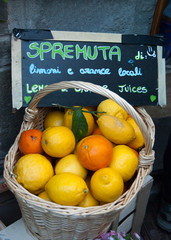 Basket in wicker with lemons and oranges of the place - La Spezia