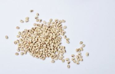 raw Job's tears or millet on white background